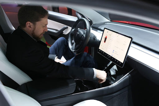 New Version of Tesla Software Allows Playing Video Games While Driving my info adda